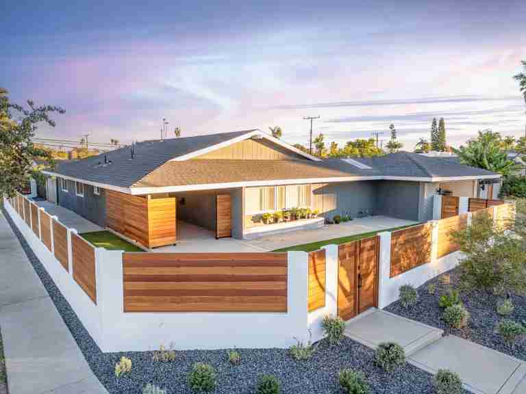 amazing front yard remodeling with wood fence and smooth stucco walls in costa mesa CA