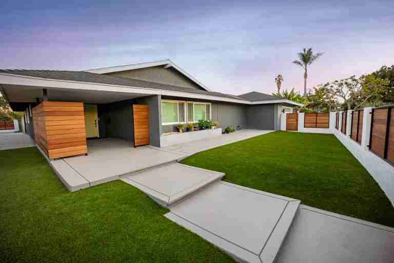 Contemporary home with landscaped yard and modern design in Anaheim, CA.