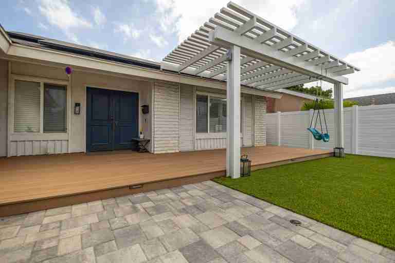 Tustin CA backyard with deck and pergola for outdoor living.